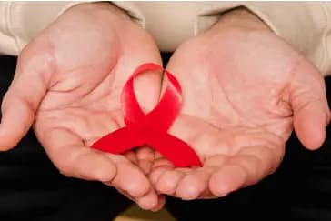 विश्व एड्स दिवस 2025: HIV/AIDS जागरूकता, लक्षण और बचाव के उपाय